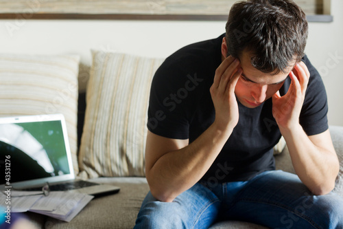 Photo: Self-employed man working at home Self-employed man working at home