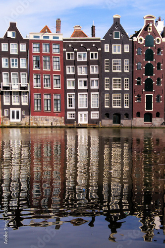 Photo: Canal houses of Amsterdam, The Netherlands with reflections Canal houses of Amsterdam, The Netherlands with reflections