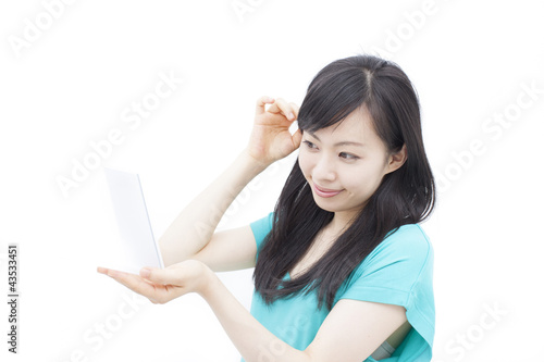 Photo: 鏡を見る女性 鏡を見る女性