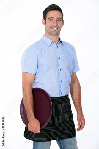Photo: Portrait of a waiter with his tray Portrait of a waiter with his tray