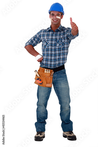 Photo: Injured builder giving the thumbs-up Injured builder giving the thumbs-up