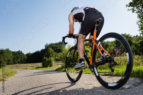 Photo: Triathlet auf dem Fahrrad Triathlet auf dem Fahrrad
