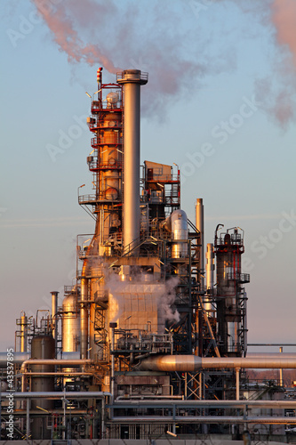 Photo: Smoke from the pipes on oil and gas refinery Smoke from the pipes on oil and gas refinery
