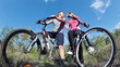 Video: View down cam of cyclists kissing and then riding on bikes View down cam of cyclists kissing and then riding on bikes