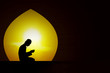Praying at sunset