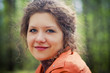 Photo: Portrait of young woman in a spring park Portrait of young woman in a spring park