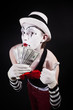 theatrical mime with dollars