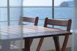 Foto: Table and chairs on a balcony Table and chairs on a balcony