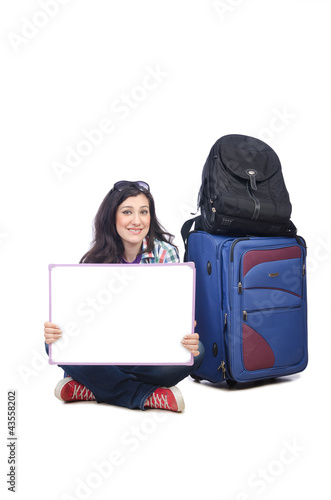 Foto: Girl preparing to travel for vacation Girl preparing to travel for vacation