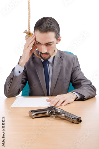 Photo: Businessman man with hand gun Businessman man with hand gun