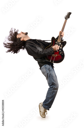 Photo: Young man playing guitar on white Young man playing guitar on white