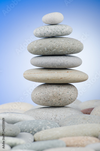 Photo: Pebbles stack against gradient background Pebbles stack against gradient background