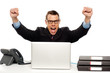 Excited businessman shouting and rejoicing