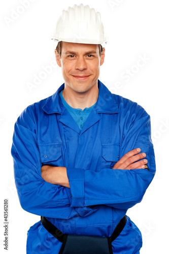Photo: Attractive repairman posing with style Attractive repairman posing with style