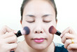 Close up Asian young woman make up.