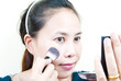 Close up Asian young woman make up.