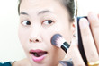 Close up Asian young woman make up.