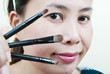 Close up Asian young woman make up.
