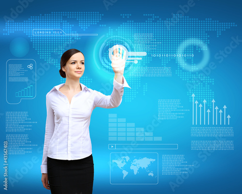 Foto: Businesswoman and technology related background Businesswoman and technology related background