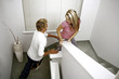 Man chasing his girlfriend on the stairs