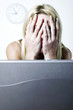Exhausted woman taking a break from her work