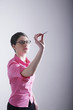 Businessman playing with darts
