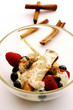 Cream with raspberry and blueberry dessert