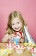 Girl playing with drinking straw