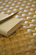 A book and pen