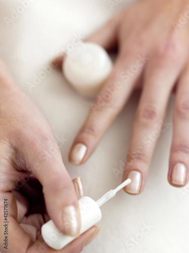 Photo: Applying nail polish Applying nail polish