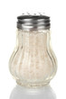 Sea salt in the salt shaker isolated on white