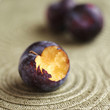 Close up of a bitten plum