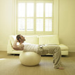 A man exercising with fitness ball