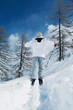 Rear view of woman skiing