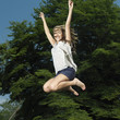 Woman jumping in the air