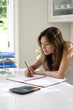 Woman working at her desk in a home office