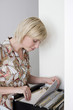 Woman looking for documents in a cabinet