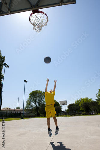 Photo: Little boy playing basketball Little boy playing basketball