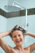 Portrait of relaxed woman taking shower
