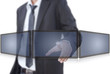 Businessman pushing on tablet screen.