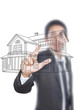Businessman pushing house plan on the white board.