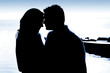 Photo: Couple in love hug in suset on sea Couple in love hug in suset on sea
