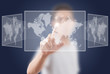 Businessman pushing Social Network world map.