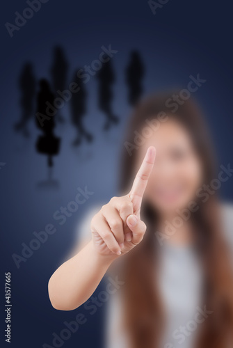Photo: Business lady touching on the whiteboard. Business lady touching on the whiteboard.