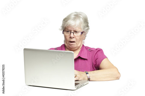 Photo: Senior using laptop Senior using laptop
