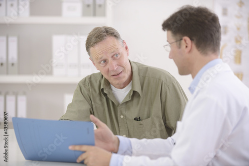 Photo: Doctor talking to patient Doctor talking to patient