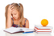 Tired little girl does homework