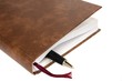 Foto: schedule closed with pen isolated schedule closed with pen isolated