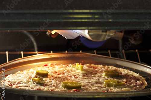 Photo: Pizza Cooking in the Oven Pizza Cooking in the Oven