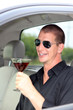 Man In Truck Holding Alcohol
